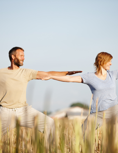 man and woman exercising